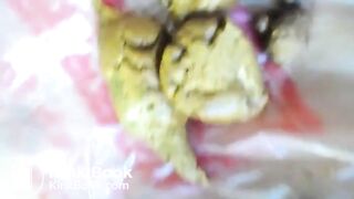 Girl poops on a plastic bag