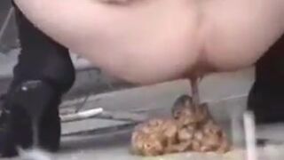 outdoors shitting unusual cleaning 042 (girl piss and enormous pile of shit