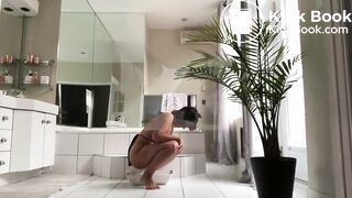 Cute Girl Shitting to Cat Litter