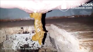 girl is pooping on outdoor toilet