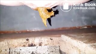 girl is pooping on outdoor toilet