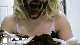 Kitty eating a plate of shit