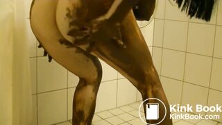 Gorgeous woman covers her body in shit