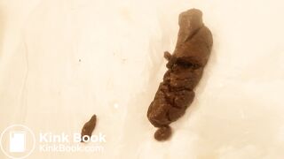 Same girl. Masturbates and squirts whilst shitting.