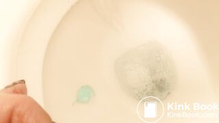 Same girl. Masturbates and squirts whilst shitting.