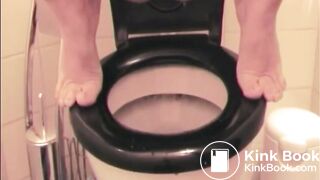 Diarrhea over black toilet