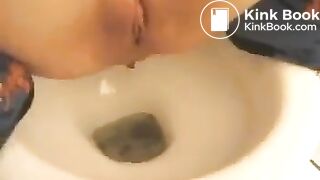 Teen with Blue Socks Has Diarrhea on the Toilet