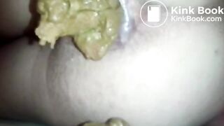 Laying on Her Side Pooping a Big Turd