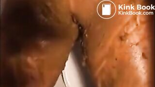 Woman smearing shit on her body
