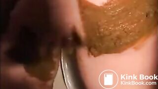 Woman smearing shit on her body