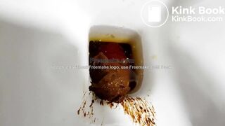 beautiful sexy blonde with a mask crapping peeing