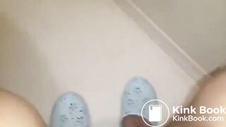 Girl having diarrhea in the toilet