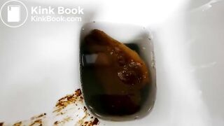 Blonde model clogs the toilet with two monster turds