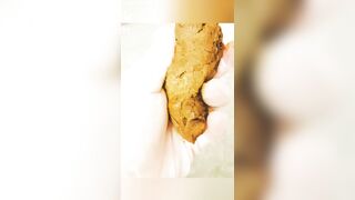 Pooping and playing.