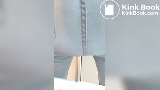 cute girl fills her blue jeans