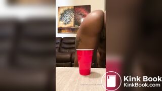 Nubian ebony shits in red cup