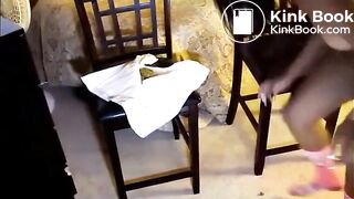 Black girl pooping between two chairs