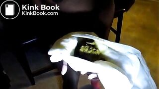 Black girl pooping between two chairs