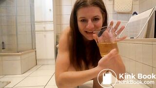 girl pee`s and shit in a cup