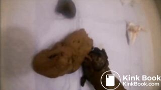 japanese girl in glasses spreads legs and shits