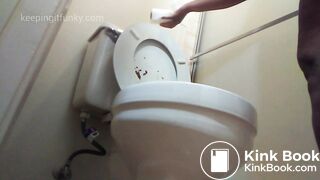 Ebony Sprays Toilet
