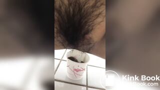 Young korean girl pooping in toilet