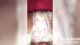 Wetting her already messy goodnites