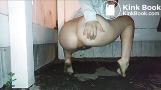 Young lady takes a shit outdoors