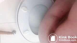 Close up of a toilet poop