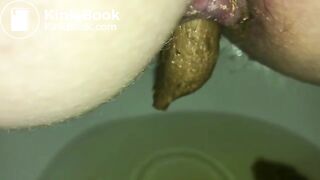 Big turd stuck in a sexy milf's ass