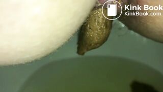 Big turd stuck in a sexy milf's ass