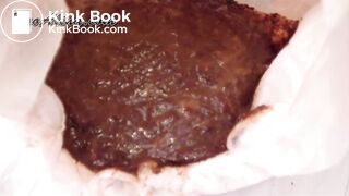 Young lady fills ladies' pampers with smelly shit