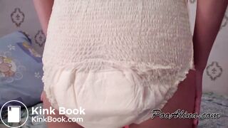 Young lady fills ladies' pampers with smelly shit