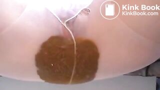 Hot brown poop in her pantyhos