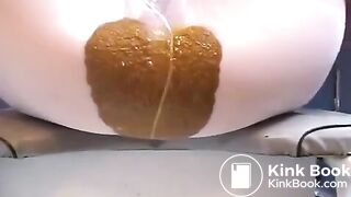 Hot brown poop in her pantyhos
