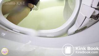 2 Japanese shitting in toilet