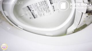 2 Japanese shitting in toilet