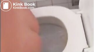 Sexy blonde girl shitting in the toilet