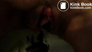 Woman shitting and pissing in the toilet