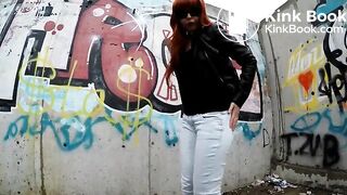 girl shits behind wall