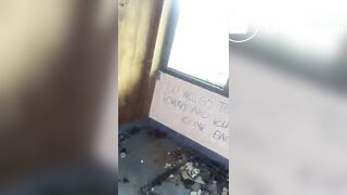 woman she pooping in an abandoned hotel