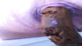 woman pooping on toilet - video 15