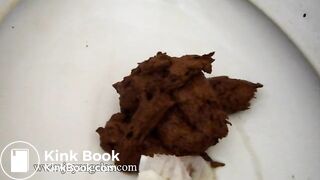 Iris pooping on the toilet