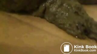 Big load of soft shit on some cardboard.