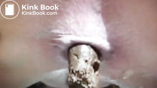 Blonde lady pooping outdoors in close up