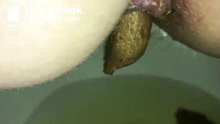 Peeing While Dropping a Firm Log into the Toilet