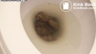 Beautiful girl poops on the toilet.