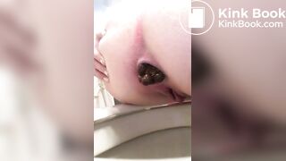 woman pooping on toilet - video 72