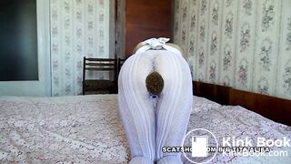 female pooping in white pantyhose - video 2