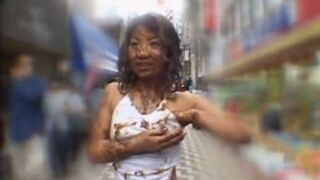 Japanese woman walks around in public covered in shit